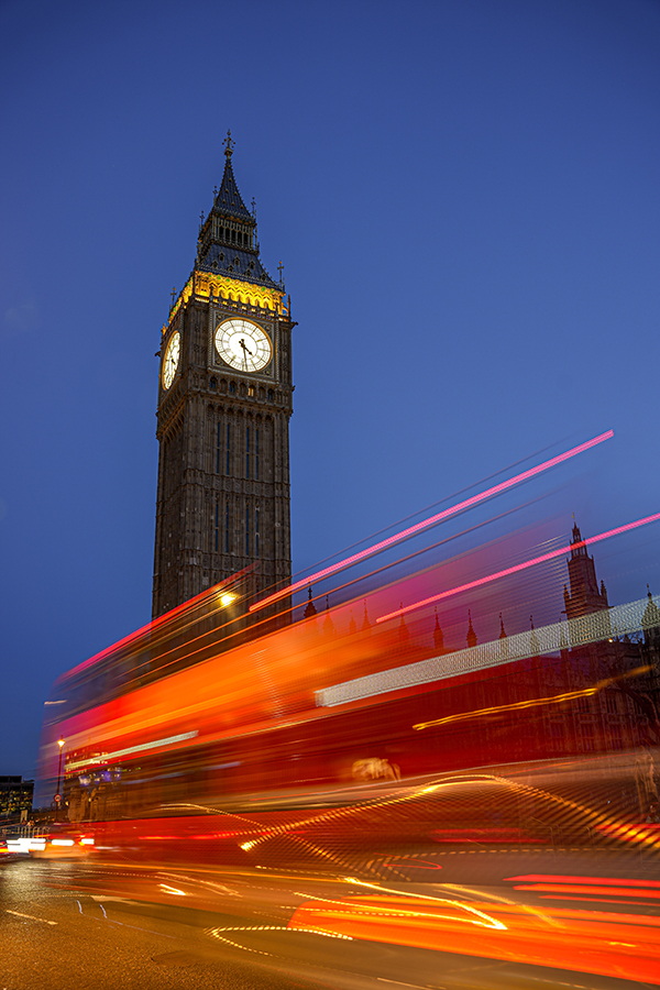 The bus passing by Big Ben in the evening. Long exposure
